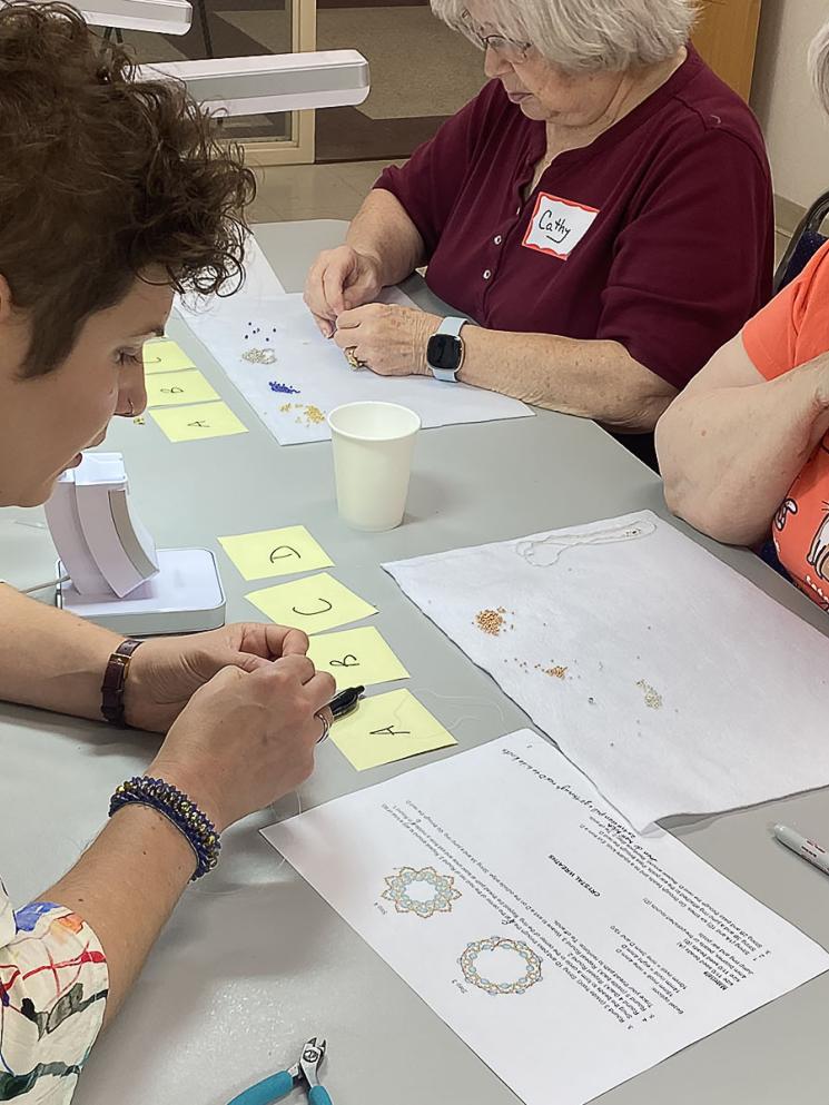 Student in bead weaving class